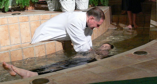 adult baptism immersed in font